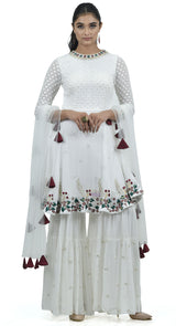 white peplum sharara suit by poshak
