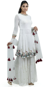 white peplum sharara suit by poshak