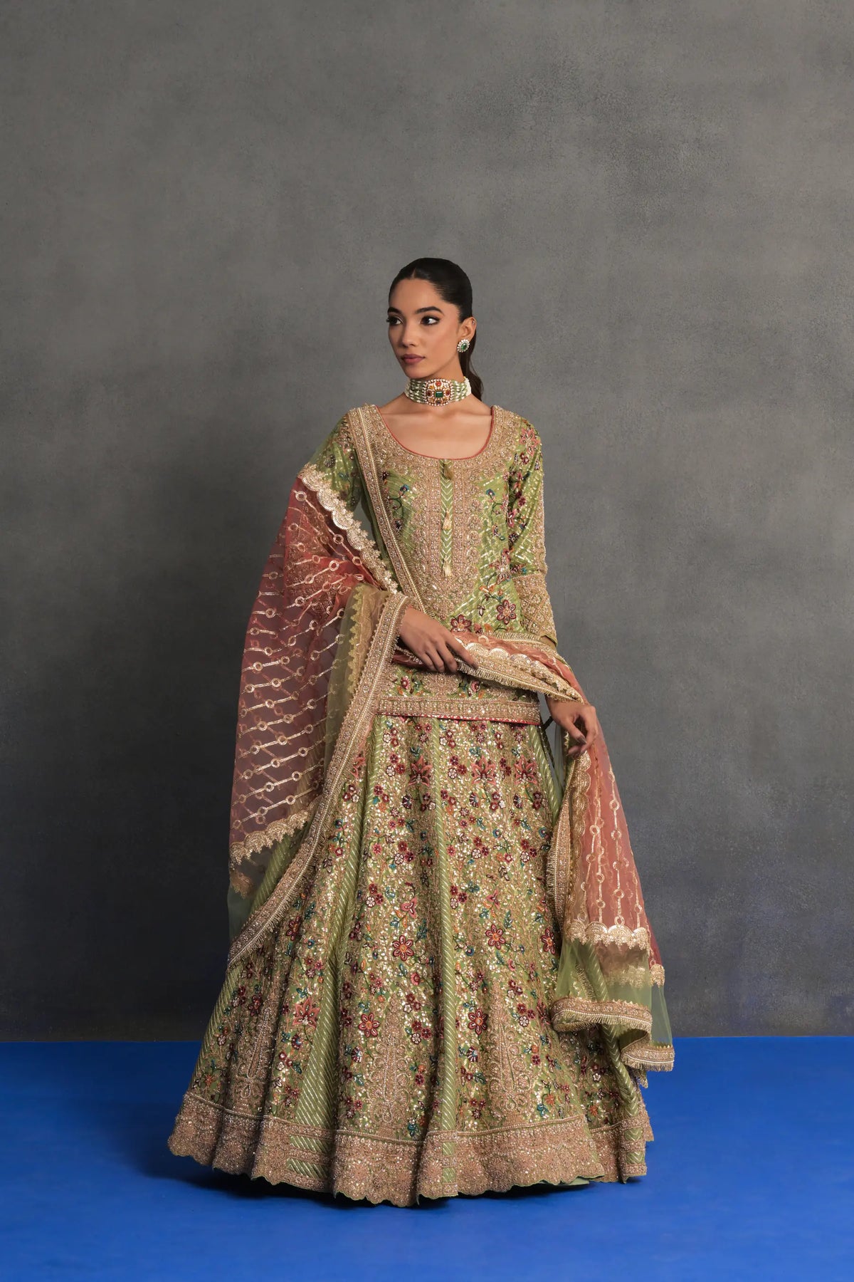 Pistachio Green Heavily Embroidered Lehenga Set
