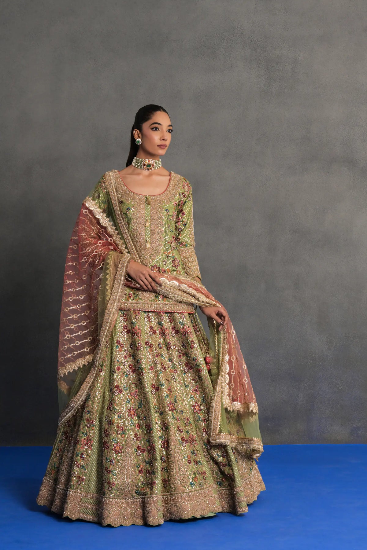 Pistachio Green Heavily Embroidered Lehenga Set
