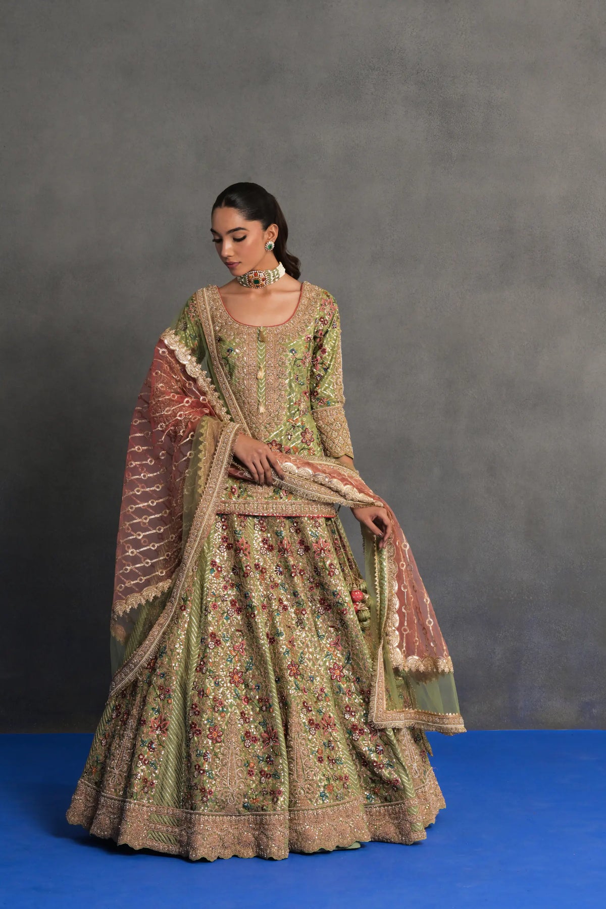 Pistachio Green Heavily Embroidered Lehenga Set